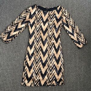 Gorgeous black and gold sequin dress